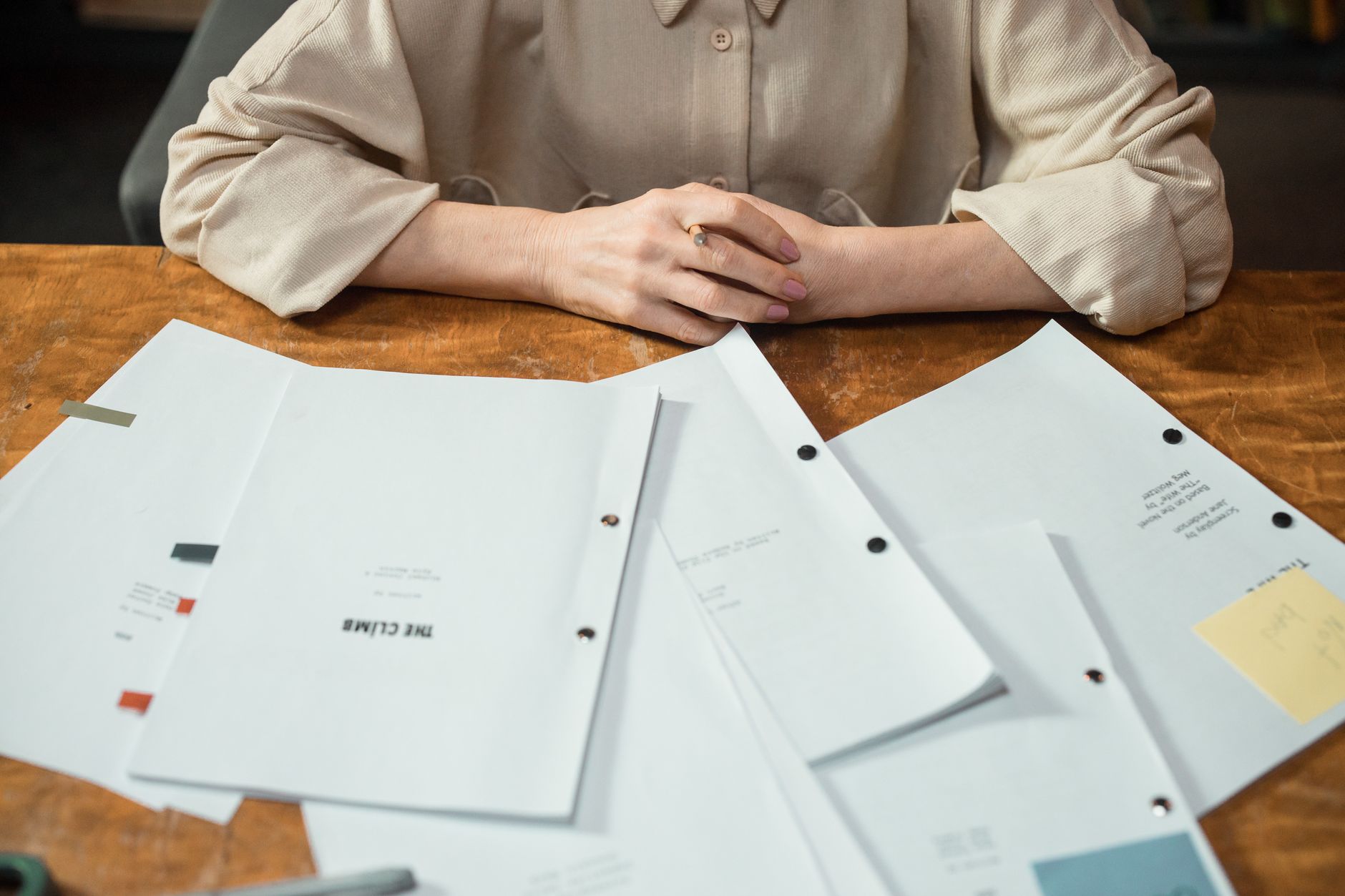 Neutral paperwork and documents laid on a table